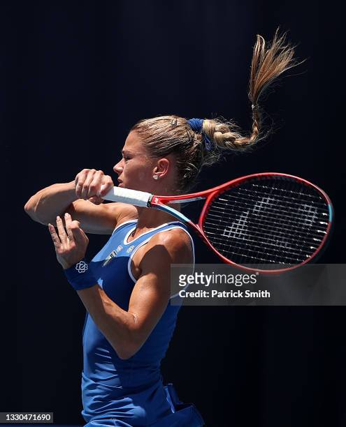 Camila Giorgi of Team Italy plays a forehand during her Women's Singles First Round match against Jennifer Brady of Team USA on day two of the Tokyo...