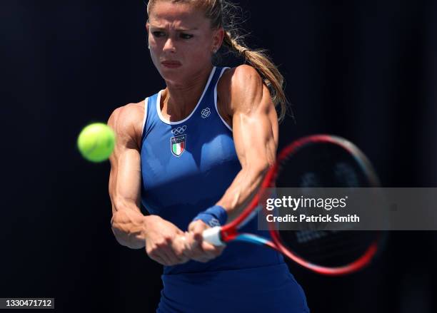 Camila Giorgi of Team Italy plays a backhand during her Women's Singles First Round match against Jennifer Brady of Team USA on day two of the Tokyo...