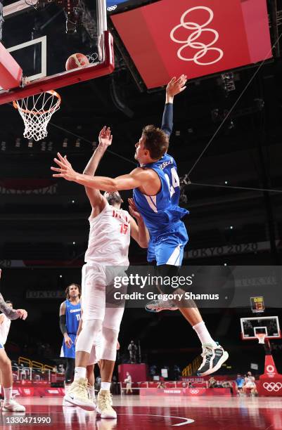 Jan Vesely of Team Czech Republic goes up for a shot against Hamed Haddadi of Team Iran during the second half on day two of the Tokyo 2020 Olympic...