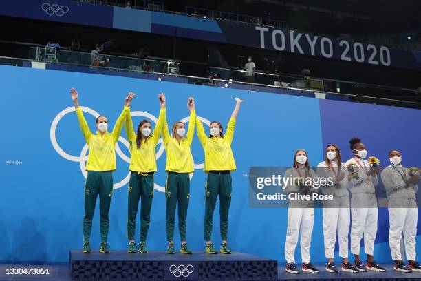 Gold medalists Bronte Campbell, Meg Harris, Emma Mckeon and Cate Campbell of Team Australia and bronze medalists Erika Brown, Abbey Weitzeil, Natalie...