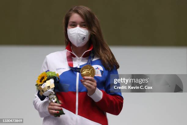 Gold Medalist and Olympic Record holder Vitalina Batsarashkina of Team ROC poses during the medal ceremony of the 10m Air Pistol Women's event on day...