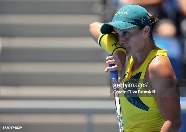 Ashleigh Barty of Team Australia feels the heat during her Women's Singles First Round match against Sara Sorribes Tormo of Team Spain on day two of...