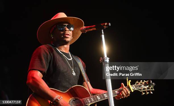 Jimmie Allen performs onstage during Brad Paisley's tour at Ameris Bank Amphitheatre on July 24, 2021 in Alpharetta, Georgia.