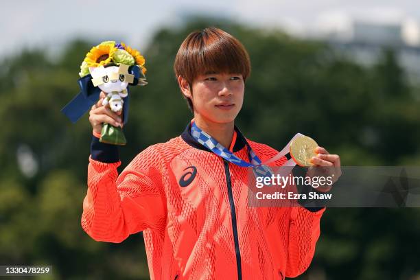 Yuto Horigome of Team Japan poses with his gold medal at the Skateboarding Men's Street Finals medal ceremony on day two of the Tokyo 2020 Olympic...