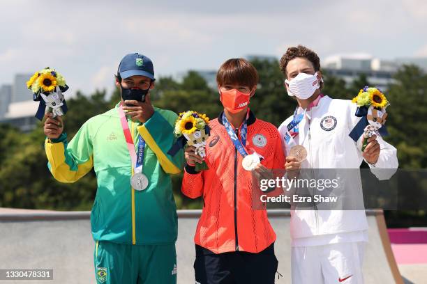 Kelvin Hoefler of Team Brazil, winner of silver medal, Yuto Horigome of Team Japan, winner of the gold medal, and Jagger Eaton of Team USA, winner of...