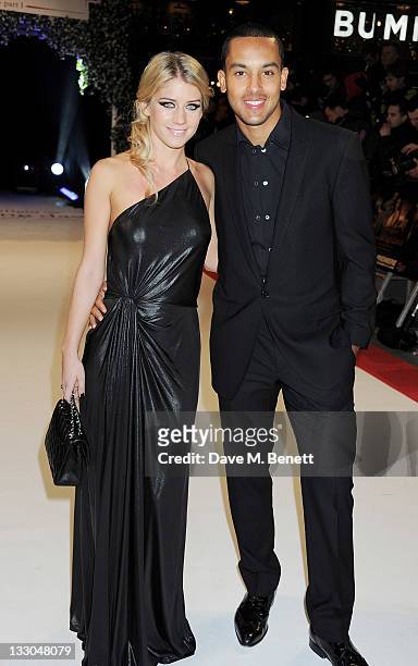 Melanie Slade and Theo Walcott attend the UK Premiere of 'The Twilight Saga: Breaking Dawn Part 1' at Westfield Stratford City on November 16, 2011...