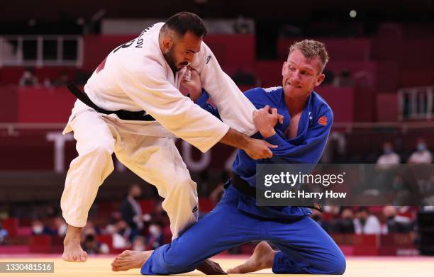 Nathan Katz of Team Australia and Baruch Shmailov of Team Israel compete during the Men’s Judo 66kg Elimination Round 16 on day two of the Tokyo 2020...