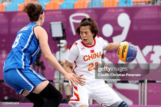 Lili Wang of Team China controls the ball during the Women's Pool Round match between China and Italy on day two of the Tokyo 2020 Olympic Games at...
