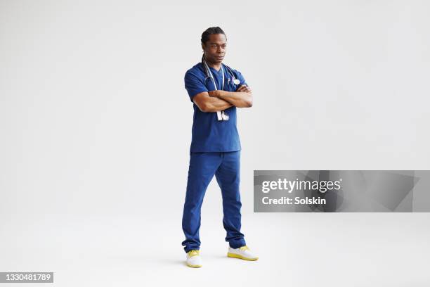 portrait of healthcare professional - full length portrait stock pictures, royalty-free photos & images