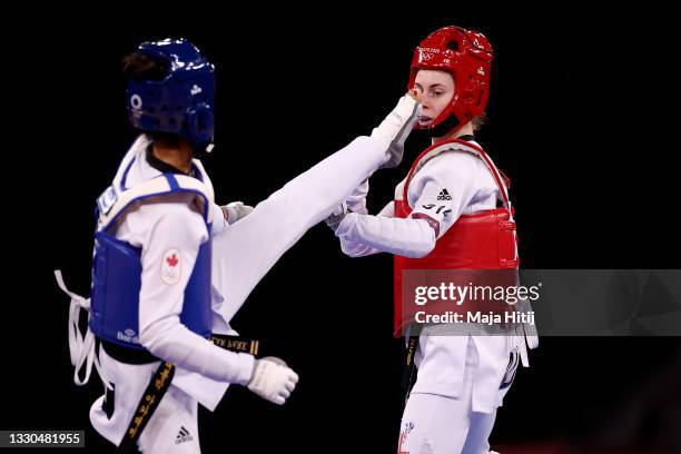 Stacey Hymer of Team Australia competes against Skylar Park of Team Canada during the Women's -57kg Taekwondo Round of 16 contest on day two of the...