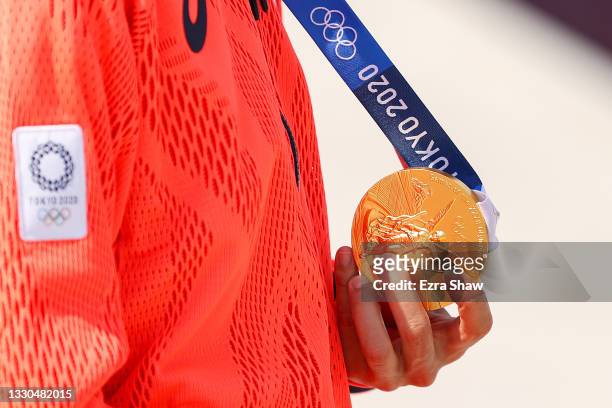 Yuto Horigome of Team Japan shows his gold medal at the Skateboarding Men's Street Finals medal ceremony on day two of the Tokyo 2020 Olympic Games...