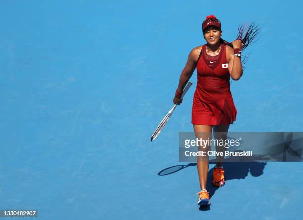 Naomi Osaka of Team Japan prepares to receive serve during her Women's Singles First Round match against Saisai Zheng of Team China on day two of the...
