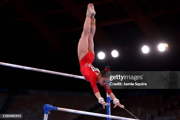 Jin Zhang of Team China competes on uneven bars during Women's Qualification on day two of the Tokyo 2020 Olympic Games at Ariake Gymnastics Centre...