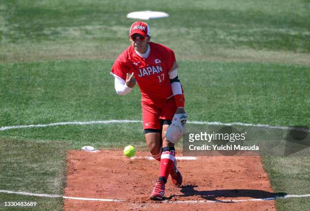 Pitcher Yukiko Ueno of Team Japan pitches against Team Canada in the first inning during the Softball Opening Round on day two of the Tokyo 2020...