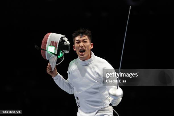 Kazuyasu Minobe of Team Japan celebrates after his win against Jakub Jurka of Team Czech Republic in Men's Individual Épée second round on day two of...