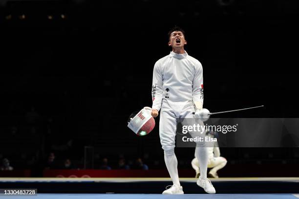 Kazuyasu Minobe of Team Japan celebrates after his win against Jakub Jurka of Team Czech Republic in Men's Individual Épée second round on day two of...