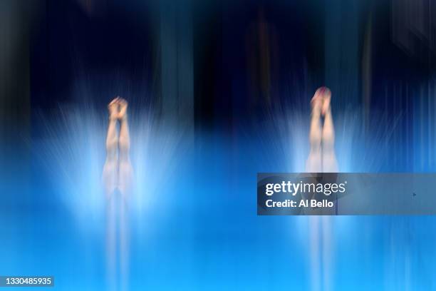 Dolores Hernandez Monzon and Carolina Mendoza Hernandez of Team Mexico compete during Women's 3m Springboard Finals on day two of the Tokyo 2020...
