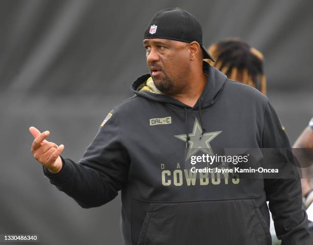 Running backs coach Skip Peete of the Dallas Cowboys runs a play training camp at River Ridge Complex on July 24, 2021 in Oxnard, California.