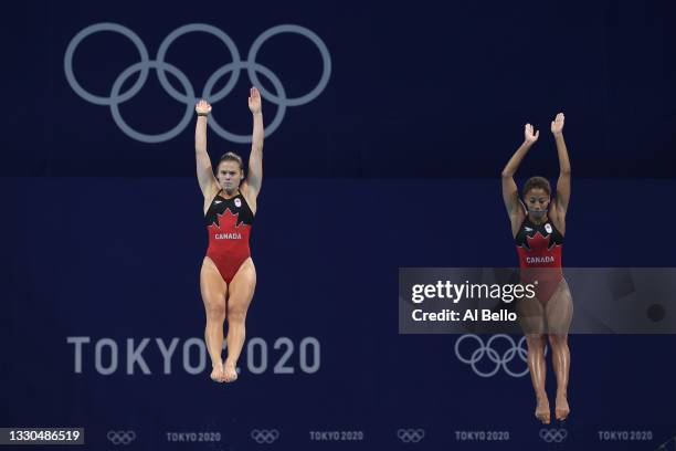 Jennifer Abel and Melissa Citrini Beaulieu of Team Canada compete during Women's 3m Springboard Finals on day two of the Tokyo 2020 Olympic Games at...