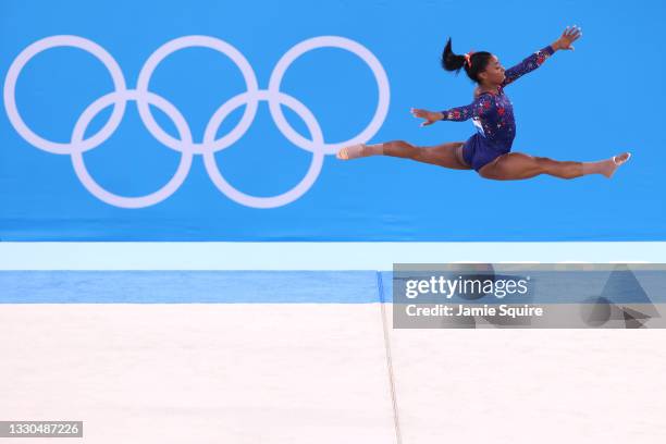 Simone Biles of Team United States competes in the floor exercise during Women's Qualification on day two of the Tokyo 2020 Olympic Games at Ariake...