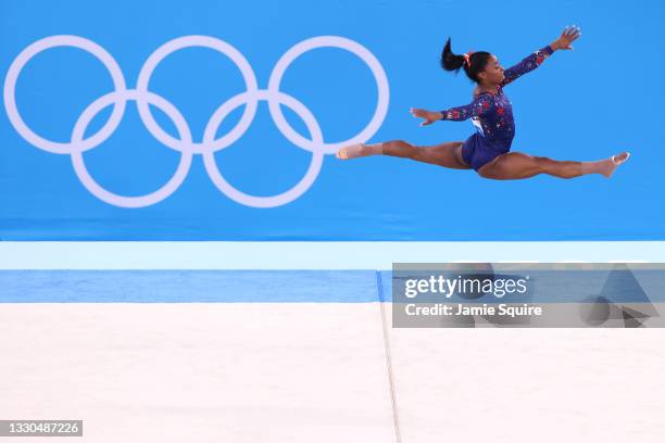Simone Biles of Team United States competes in the floor exercise during Women's Qualification on day two of the Tokyo 2020 Olympic Games at Ariake...
