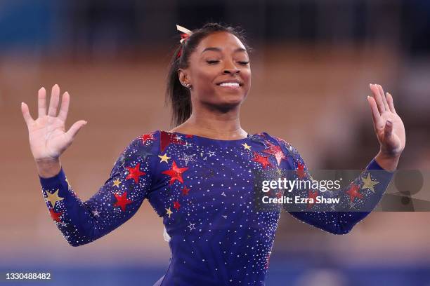 Simone Biles of Team United States competes in the floor exercise during Women's Qualification on day two of the Tokyo 2020 Olympic Games at Ariake...