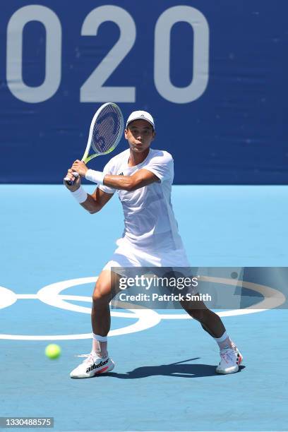 Yen-Hsun Lu of Team Chinese Taipei plays a backhand during his Men's Singles First Round match against Alexander Zverev of Team Germany on day two of...