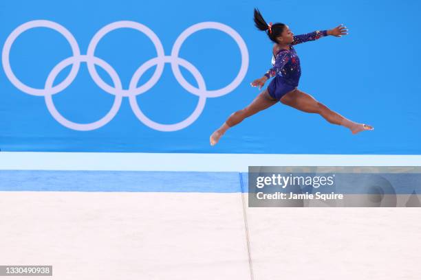 Simone Biles of Team United States competes in the floor exercise during Women's Qualification on day two of the Tokyo 2020 Olympic Games at Ariake...