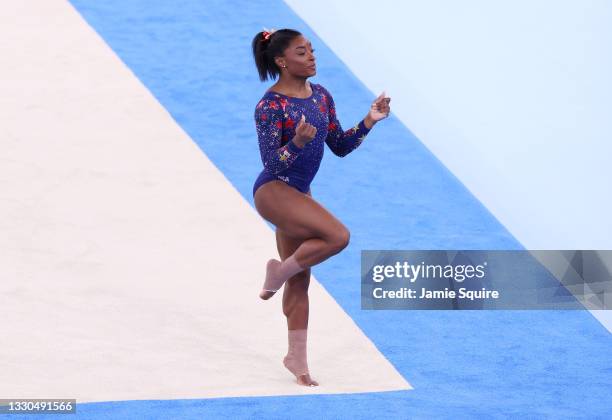 Simone Biles of Team United States competes in the floor exercise during Women's Qualification on day two of the Tokyo 2020 Olympic Games at Ariake...