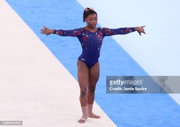 Simone Biles of Team United States competes in the floor exercise during Women's Qualification on day two of the Tokyo 2020 Olympic Games at Ariake...