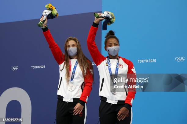 Jennifer Abel and Melissa Citrini Beaulieu of Team Canada pose with the silver medals on the podium during the medal ceremony for the Women's 3m...