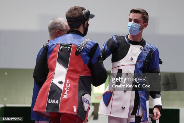 Lucas Kozeniesky of Team United States congratulates Gold Medalist William Shaner of Team United States following the 10m Air Rifle Men's event event...
