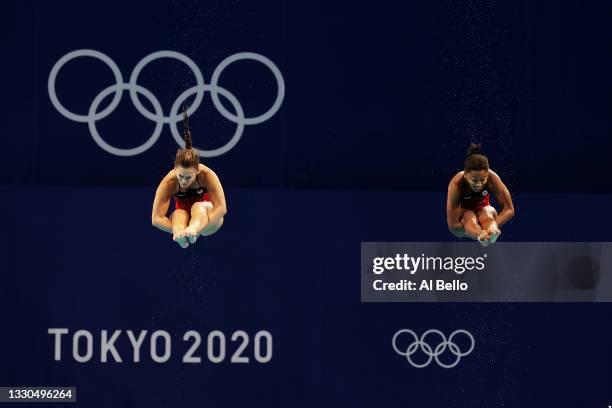 Jennifer Abel and Melissa Citrini Beaulieu of Team Canada compete during Women's 3m Springboard Finals on day two of the Tokyo 2020 Olympic Games at...