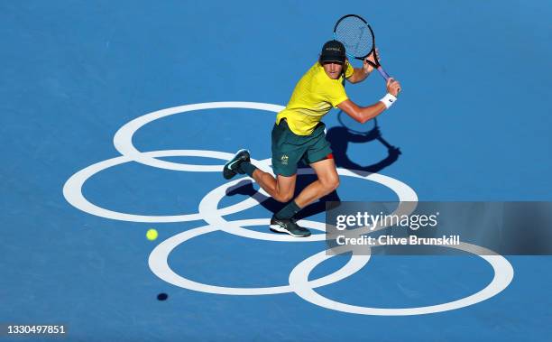 Max Purcell of Team Australia plays a backhand during his Men's Singles First Round match against Felix Auger-Aliassime of Team Canada on day two of...