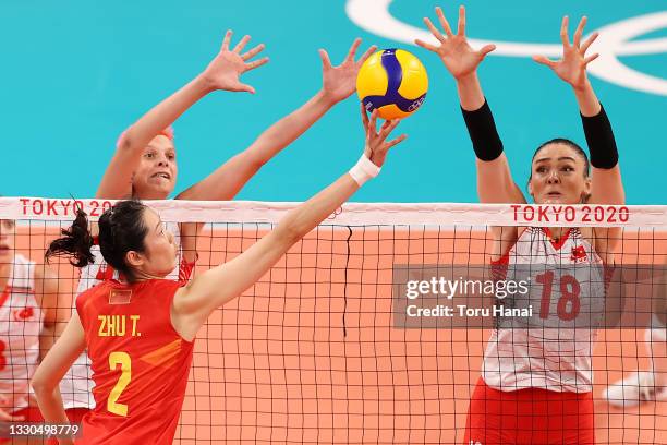 Ting Zhu of Team China attempts to tip over Zehra Gunes of Team Turkey during the Women's Preliminary - Pool B on day two of the Tokyo 2020 Olympic...