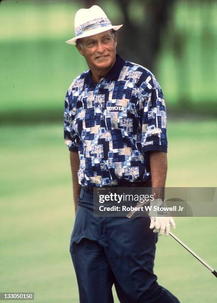 Juan "Chi Chi" Rodriguez smiles after holing out during the US Senior Open, FL 1996.