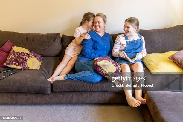 family spend time together at home - australian family time stock-fotos und bilder