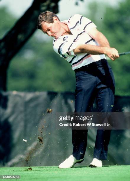 Fuzzy Zoeller keeps head on target as he tees off during the Canon Greater Hartford Open, Cromwell CT 1992.