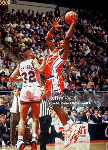 Syracuse's Steven Thompson skies for a rebound against the University of Connecticut, Hartford, CT, 1990.