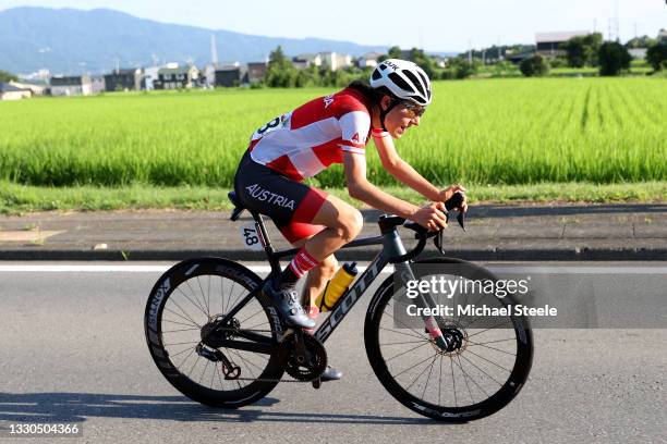 Anna Kiesenhofer of Team Austria in the breakaway during the Women's road race on day two of the Tokyo 2020 Olympic Games at Fuji International...