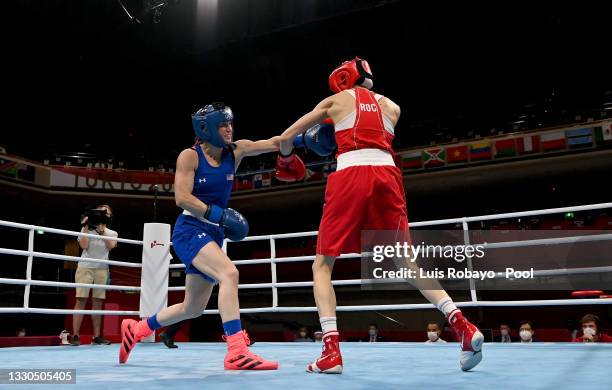 Svetlana Soluianova of Russian Olympic Committee exchanges punches with Virginia Fuchs of the United States during the Women's Fly on day two of the...