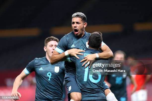 Facundo Medina of Team Argentina celebrates after scoring their side's first goal during the Men's First Round Group C match between Egypt and...