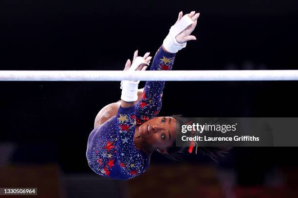 Simone Biles of Team United States competes on uneven bars during Women's Qualification on day two of the Tokyo 2020 Olympic Games at Ariake...