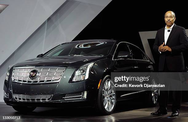 Ed Welburn, General Motor’s Global Chief designer, unveils the Cadillac 2013 XTS is unveiled during the LA Auto Show on November 16, 2011 in Los...