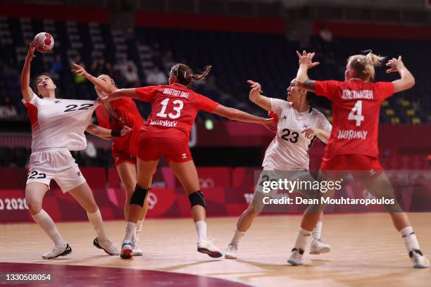 Gim Boeun of Team South Korea and Marit Jacobsen of Team Norway compete for the ball under pressure from Kari Brattset Dale and Veronica Kristiansen...