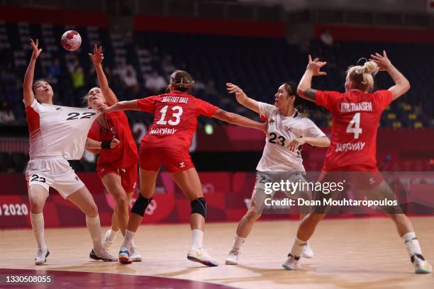 Gim Boeun of Team South Korea and Marit Jacobsen of Team Norway compete for the ball under pressure from Kari Brattset Dale and Veronica Kristiansen...