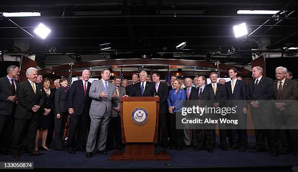 Rep. Mike Simpson speaks as other congressioal members look on during a news conference November 16, 2011 on Capitol Hill in Washington, DC. The news...
