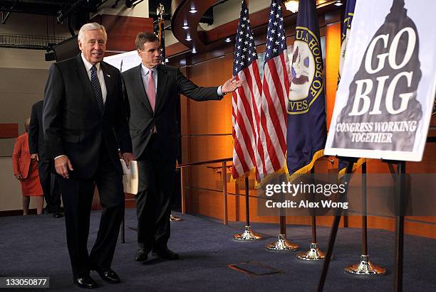 House Minority Whip Rep. Steny Hoyer and Sen. Mark Warner arrive for a news conference November 16, 2011 on Capitol Hill in Washington, DC. The news...