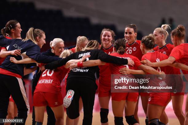 Team Norway celebrate after winning the Women's Preliminary Round Group A match between Norway and South Korea on day two of the Tokyo 2020 Olympic...