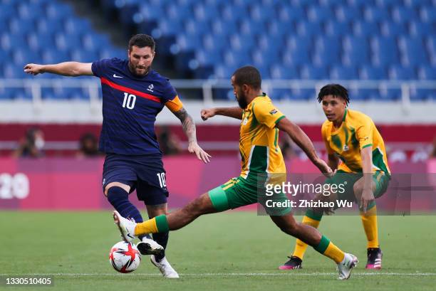 Gignac Andre-Pierre of Team France competes for tha ball with Frosler Reeve of Team South Africa during the Men's First Round Group A match between...